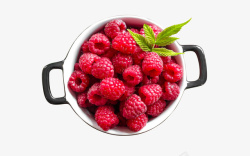 盘子里的新鲜燕窝新鲜水果树莓高清图片
