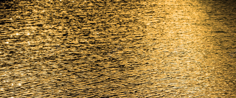 玻璃深色水滴金色黄色背景