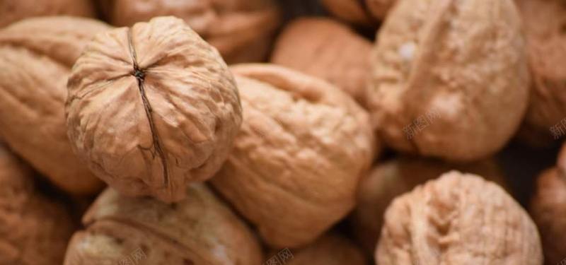 核桃背景图jpg设计背景_88icon https://88icon.com 海报banner 核桃 特写 黄色