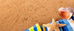 黄色毛巾海滩贝壳背景高清图片