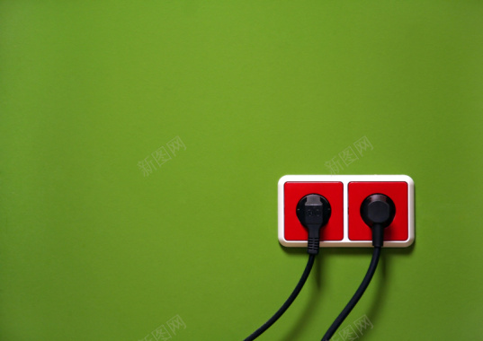 绿色墙壁上的红色插座背景素材背景
