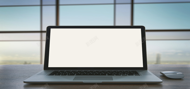 玻璃前的空白电脑背景背景