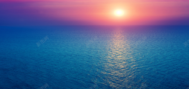 蓝色海面日出背景