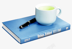 蓝色书本上的咖啡杯素材