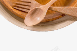 木质工具深棕色木质纹理盛着勺子叉子的圆高清图片