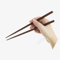 商务质感画册灰色拿筷子的手夹美食高清图片