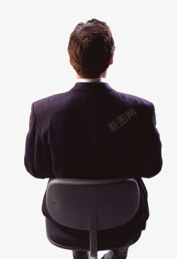 穿黑色西装端坐在转椅上的男性背素材