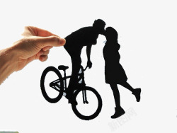 甜蜜自行车手中的情侣创意剪纸艺术高清图片