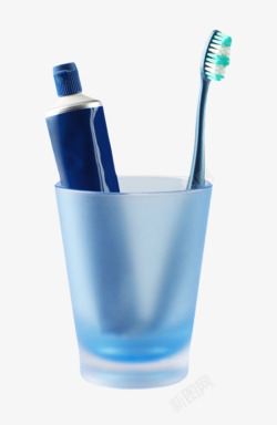 各种清洁工具蓝色塑料杯子里的牙膏和牙刷高清图片
