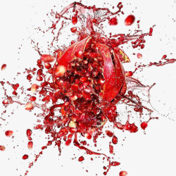 飞溅的水果红色石榴炸裂果汁飞溅高清图片