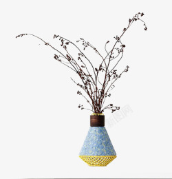 黄色装饰物花瓶和干树枝高清图片