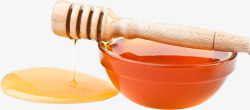 盛满蜂蜜碗具木质蜂蜜棒素材