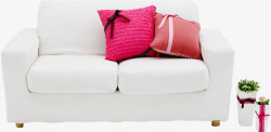 粉红色枕头白色双人沙发高清图片