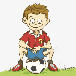 草地上坐着足球的小男孩素材