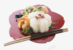 红色盘子内的筷子和米饭酱菜素材