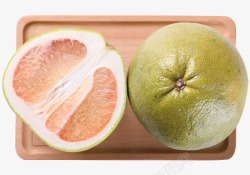 蜜柚实拍木盘上的柚子高清图片