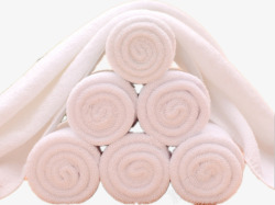 一条毛巾搭在六个毛巾卷上素材