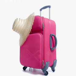 粉红色行李箱和草帽素材