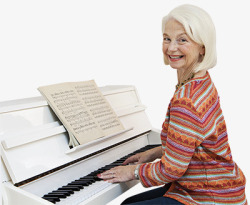 微笑着弹钢琴在弹琴的女人高清图片