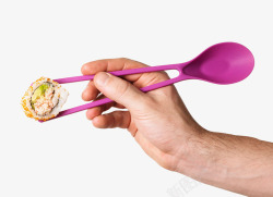 筷子夹着的寿司素材