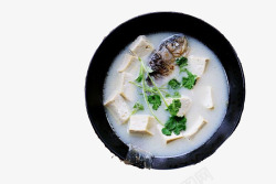 白鲫鱼黑色圆形碗鲫鱼豆腐汤香菜素材