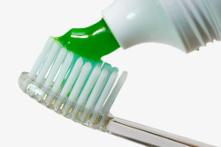 挤压出绿色物体的牙膏管实物素材