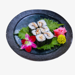鳗鱼寿司黑色圆盘鳗鱼寿司食品餐饮高清图片