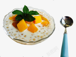 蓝色勺子牛奶芒果饮品高清图片