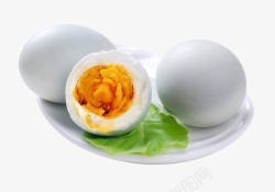 白色鸭蛋一盘白色咸鸭蛋菜叶高清图片