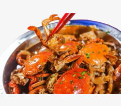 肉蟹煲筷子夹起香辣肉蟹煲高清图片