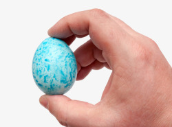 蓝色禽蛋手捏着的食用彩蛋实物素材